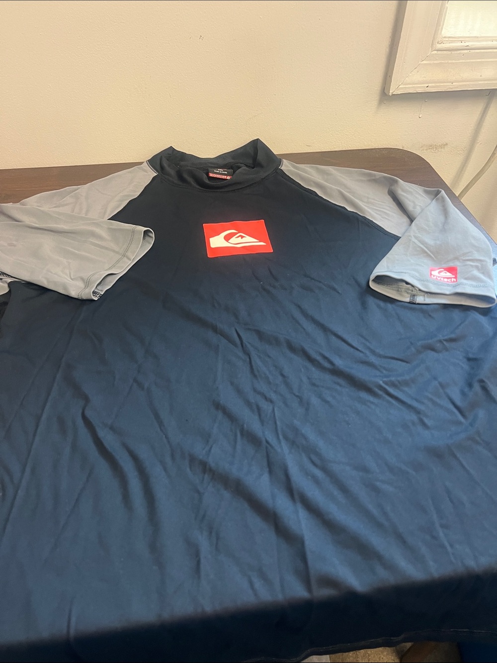 Quiksilver Black and Gray Short Sleeve Rash Guard with Red Logo